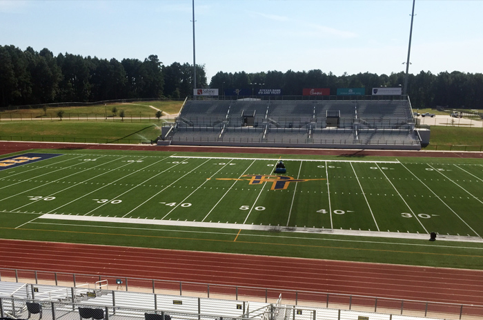 Before (right) and after (left) Clean Sweep Cleaning Service maintenance at Pine Tree ISD’s Pirate Stadium in Longview, Texas.