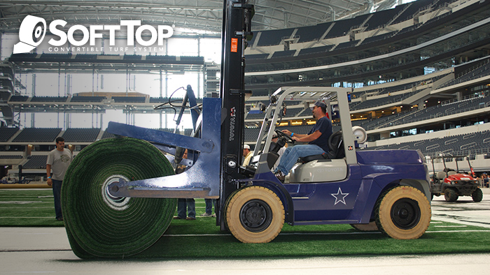 The SoftTop Convertible Turf System being installed at the AT&T Stadium in Arlington, TX, home of the Dallas Cowboys.